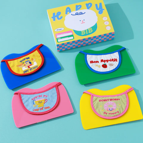 Doggu Foodie Bib - all 4 designs flat lay with gift box
